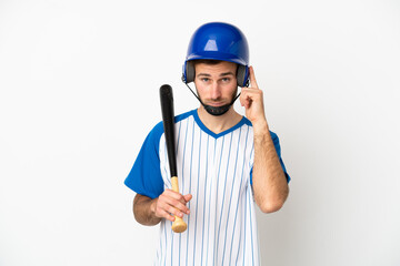 Young caucasian man playing baseball isolated on white background thinking an idea