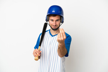 Young caucasian man playing baseball isolated on white background making money gesture