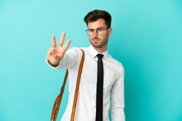 Business man over isolated background happy and counting three with fingers