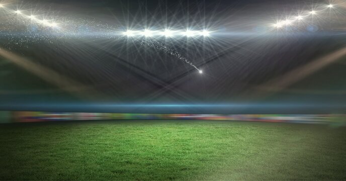 Composition of spotlights over empty stands in sports stadium