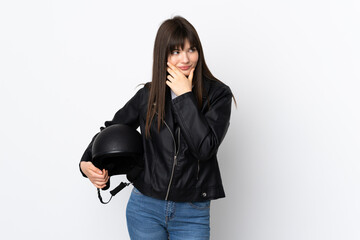 Woman holding a motorcycle helmet isolated on white background thinking an idea