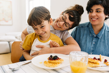 Family having fun while having breakfast