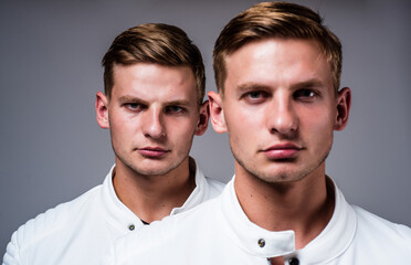 young twin brothers with similar appearance, twins