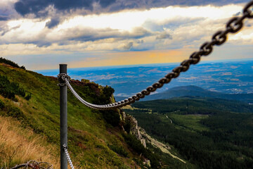 metal chains section of the trail in the mountain in the evening