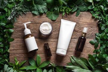 Skin care products on green leaves