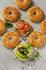 Fresh healthy sandwiches with seeded bagel, slad  and cotage cheese