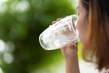 woman drinking fresh water, healthcare concept