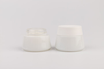 Beauty Cream Texture Close Up. Cosmetic Skincare Product In Jar On White Background. High Quality