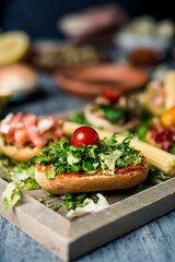 assorted vegan appetizer in a wooden tray