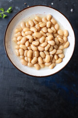 white beans boiled legumes ready to eat bean diet on the table healthy food meal snack copy space food background rustic top view keto or paleo diet
