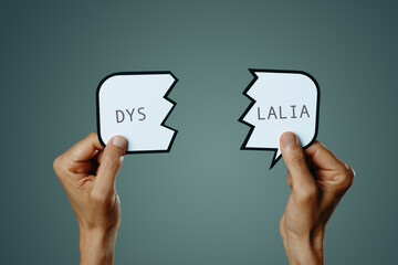 text dyslalia in a broken speech bubble