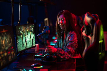 A young chinese gamer participates in esports competitions. Conducts an online broadcast and stream...
