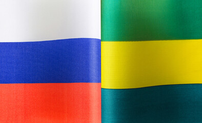 fragments of the national flags of Russia and the Gabonese Republic close-up