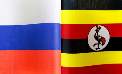 fragments of the state flags of Russia and the Republic of Uganda close-up