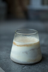 A glass of espresso shot mixed with cold fresh milk