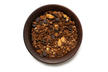 Chocolate granola cereal with nuts in a bowl background.