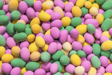 Group of colorful peanuts in glaze.