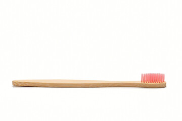 Bamboo toothbrush isolated on a white background.