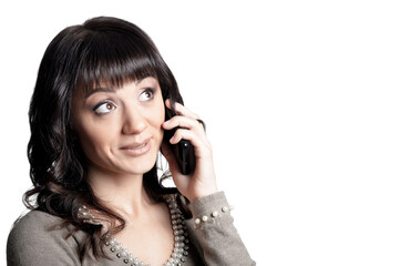 portrait of beautiful young woman talking on phone   isolated on white background