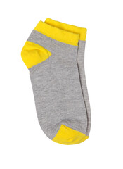 Pair of gray socks with yellow edging isolated on white background