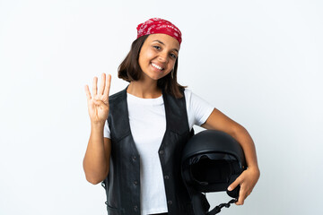 Young woman holding a motorcycle helmet isolated on white happy and counting four with fingers