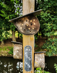 insect and bee hotel, shelter next to the creek. Messancy lake and park in Belgium