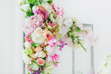 Floral decor. Beautiful bouquet of flowers on blurred background. Wedding decor. 