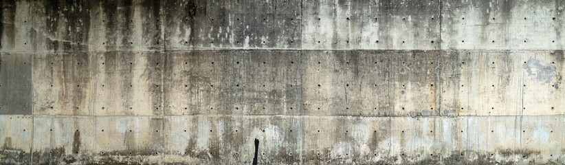 Grunge cracked concrete wall texture background.