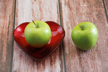 the fruit of a natural sweet green apple