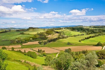 Fototapeta na wymiar Beautiful tuscan landscape with valleys and hills in springtime (Italy-Tuscany-Pisa city)