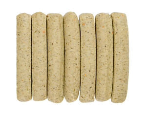Vegan Bratwurst sausages, in a row, from above, isolated, over white. Group of Franconian sausages, a variety of German bratwurst, made of saitan, a wheat gluten. Close-up from above macro food photo.