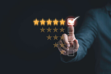 Businessman touching for marking to select five yellow stars , Client and customer satisfaction for...