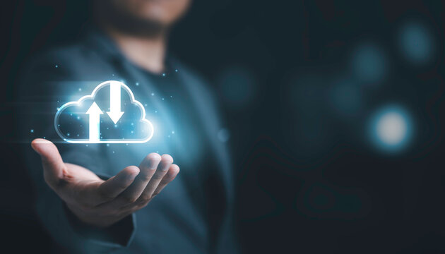 Businessman holding and giving virtual cloud computing with copy space to transfer data information and upload download application. Technology transformation concept.