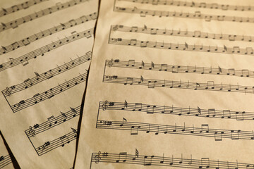 Naklejka premium Many old note sheets as background, closeup