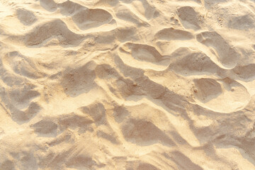 Fototapeta na wymiar Sand pattern texture in tropical beach as background.