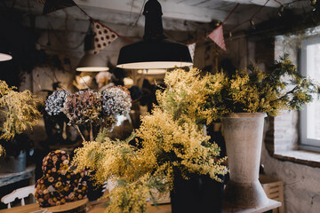 Decorative shop full with dried flowers and decorative items
