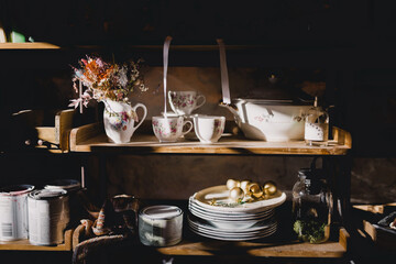 Shelves with decorative elements in a decorating workshop
