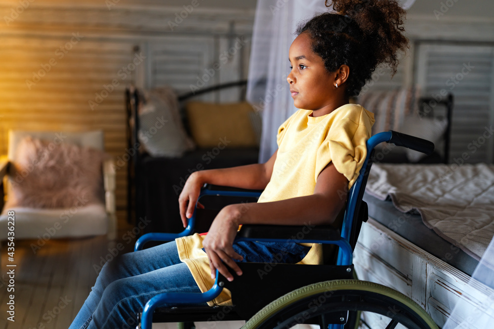 Wall mural portrait of disabled black girl with wheelchair at home