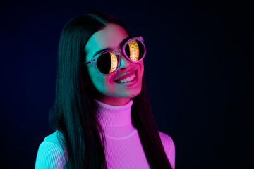 Profile side photo of young cheerful girl happy positive smile clubber retro glasses isolated over dark color background