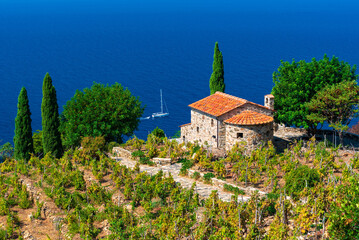 a small church overlooking the sea in the elba island
