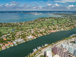 Aerial waterway of waterfront properties Miami Beach along Collins and Pine Tree Drive La Gorce...