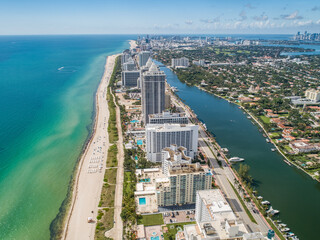 Aerial ocean view of Miami South Beach along Collins Avenue yacht marina blue green diamond