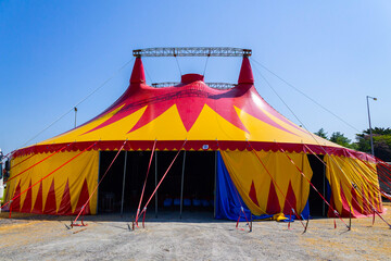 Circus Big Top tent against blue sky - obrazy, fototapety, plakaty