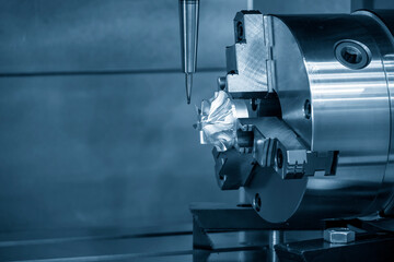 The  4-axis machining center cutting the turbocharger blade with solid ball end mill tool. The...