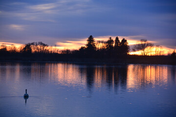 Naklejka premium Magnificent purple orange lake sunset