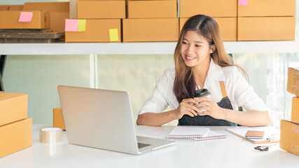 Business people doing business in finance and calculating, analyzing, graphing on costs of investments, real estate and more, tax system on the desk with laptops and calculators with documents