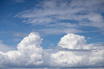 cumulus clouds in the blue sky