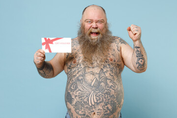 Young happy fat pudge obese chubby overweight blue-eyed bearded man 30s has big belly with naked...