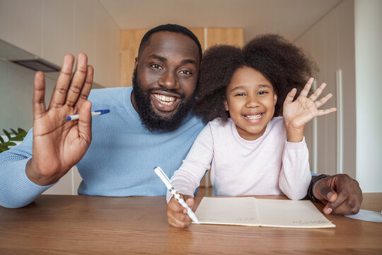 Father And Daughter African Amercian Family Smiling Waving Hand To Camera