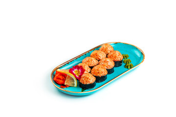 Japanese baked sushi rolls with wasabi, slice lemon and marinated ginger, tasty food for restaurant or cafe menu, seafood, isolated
